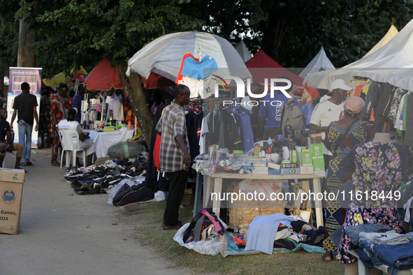 Sellers display sportswear and souvenirs during the 11th All Africa University Games at the University of Lagos, Akoka in Lagos, Nigeria, on...