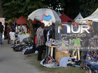 Sellers display sportswear and souvenirs during the 11th All Africa University Games at the University of Lagos, Akoka in Lagos, Nigeria, on...