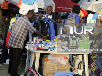 Sellers display sportswear and souvenirs during the 11th All Africa University Games at the University of Lagos, Akoka in Lagos, Nigeria, on...