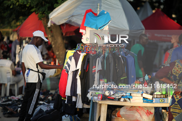 Sellers display sportswear and souvenirs during the 11th All Africa University Games at the University of Lagos, Akoka in Lagos, Nigeria, on...