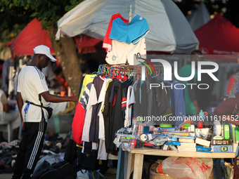 Sellers display sportswear and souvenirs during the 11th All Africa University Games at the University of Lagos, Akoka in Lagos, Nigeria, on...