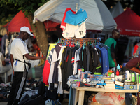 Sellers display sportswear and souvenirs during the 11th All Africa University Games at the University of Lagos, Akoka in Lagos, Nigeria, on...