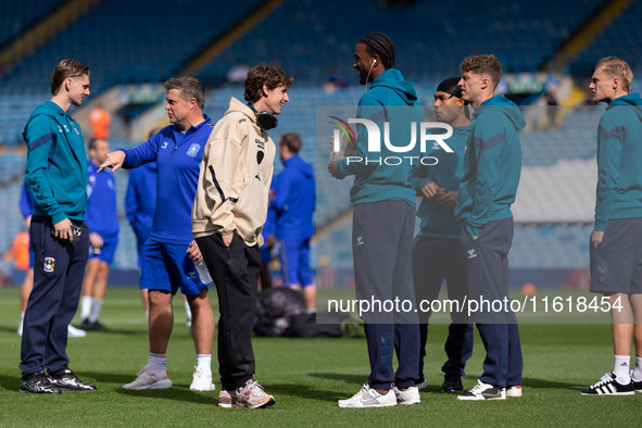 Brenden Aaronson (Leeds United) talks to USMNT teammate Haji Wright (Coventry City) before the Sky Bet Championship match between Leeds Unit...