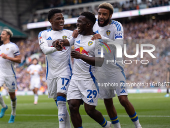 Willy Gnonto (Leeds United) scores his team's first goal and celebrates with Largie Ramazani (Leeds United) and Jayden Bogle (Leeds United)...