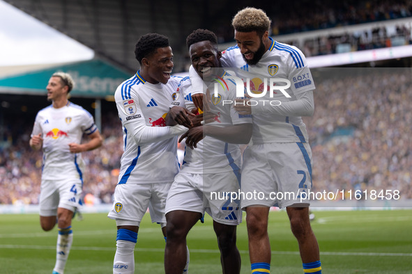 Willy Gnonto (Leeds United) scores his team's first goal and celebrates with Largie Ramazani (Leeds United) and Jayden Bogle (Leeds United)...