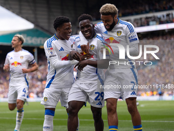 Willy Gnonto (Leeds United) scores his team's first goal and celebrates with Largie Ramazani (Leeds United) and Jayden Bogle (Leeds United)...