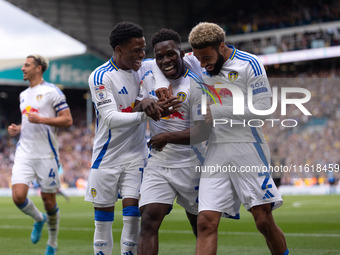 Willy Gnonto (Leeds United) scores his team's first goal and celebrates with Largie Ramazani (Leeds United) and Jayden Bogle (Leeds United)...