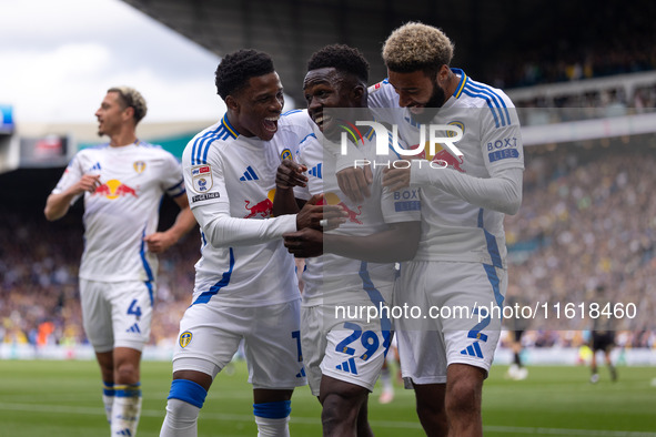 Willy Gnonto (Leeds United) scores his team's first goal and celebrates with Largie Ramazani (Leeds United) and Jayden Bogle (Leeds United)...