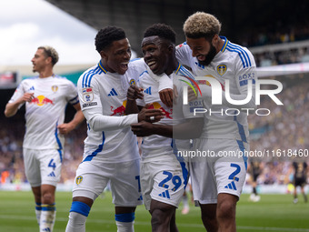 Willy Gnonto (Leeds United) scores his team's first goal and celebrates with Largie Ramazani (Leeds United) and Jayden Bogle (Leeds United)...