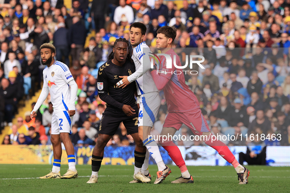 Illan Meslier (Leeds United) pushes Ilia Gruev (Leeds United) into Brandon Thomas-Asante (Coventry City) during the Sky Bet Championship mat...