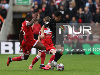 Stoke City's Bae Jun-Ho is in action with Middlesbrough's Anfernee Dijksteel during the Sky Bet Championship match between Middlesbrough and...