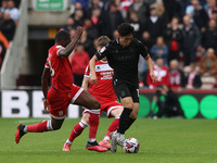 Stoke City's Bae Jun-Ho is in action with Middlesbrough's Anfernee Dijksteel during the Sky Bet Championship match between Middlesbrough and...