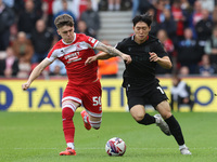 Bae Jun-Ho of Stoke City is in action against Middlesbrough's Ben Doak during the Sky Bet Championship match between Middlesbrough and Stoke...