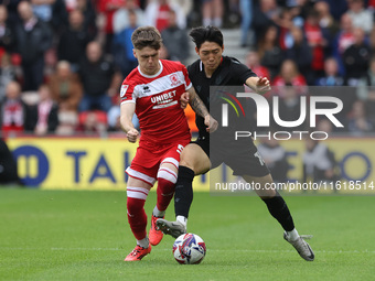 Bae Jun-Ho of Stoke City is in action against Middlesbrough's Ben Doak during the Sky Bet Championship match between Middlesbrough and Stoke...