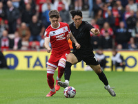 Bae Jun-Ho of Stoke City is in action against Middlesbrough's Ben Doak during the Sky Bet Championship match between Middlesbrough and Stoke...