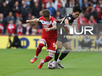 Bae Jun-Ho of Stoke City is in action against Middlesbrough's Ben Doak during the Sky Bet Championship match between Middlesbrough and Stoke...