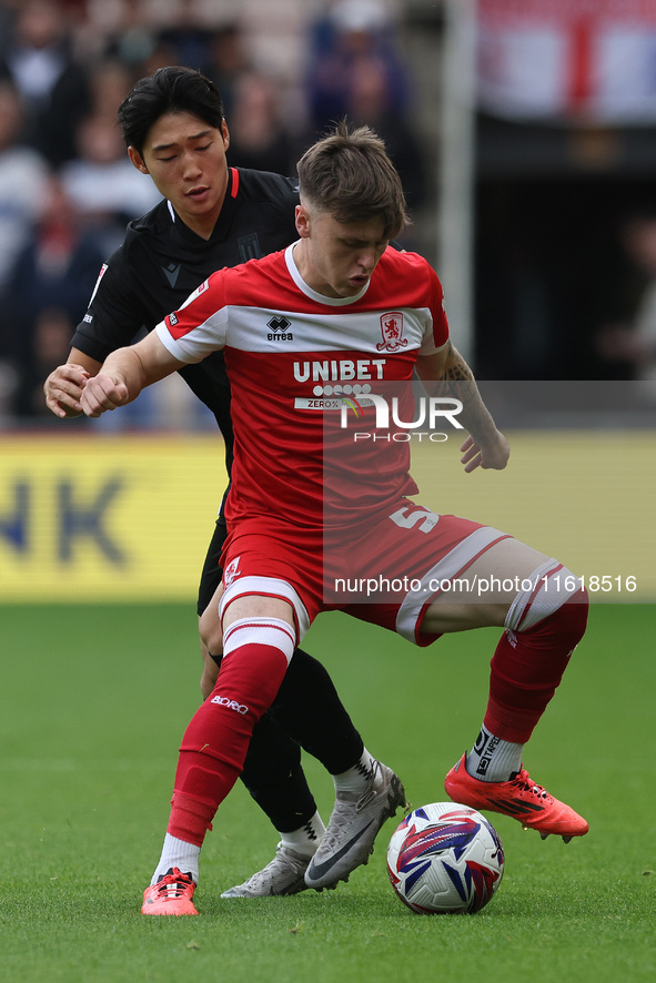 Bae Jun-Ho of Stoke City is in action against Middlesbrough's Ben Doak during the Sky Bet Championship match between Middlesbrough and Stoke...