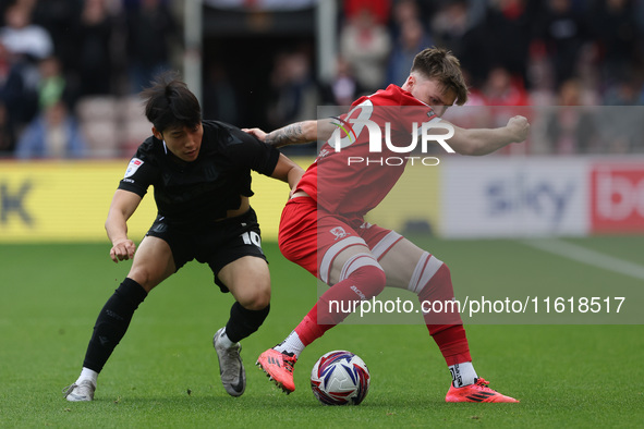 Bae Jun-Ho of Stoke City is in action against Middlesbrough's Ben Doak during the Sky Bet Championship match between Middlesbrough and Stoke...