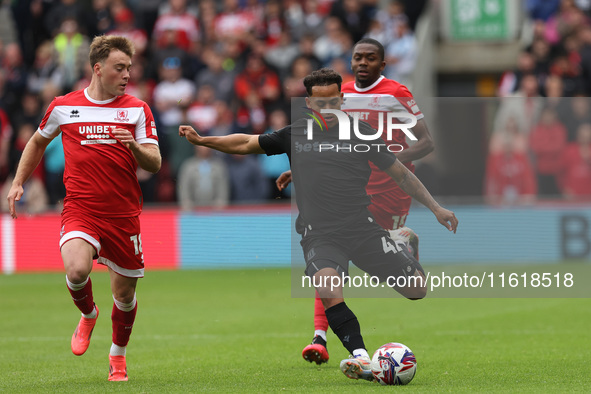 Stoke City's Million Manhoef is in action with Middlesbrough's Aidan Morris during the Sky Bet Championship match between Middlesbrough and...