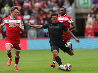 Stoke City's Million Manhoef is in action with Middlesbrough's Aidan Morris during the Sky Bet Championship match between Middlesbrough and...