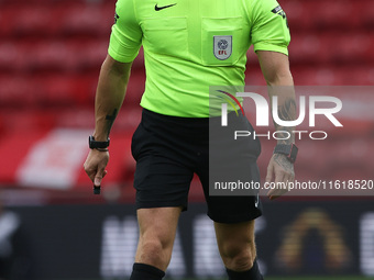 Match referee Stephen Martin during the Sky Bet Championship match between Middlesbrough and Stoke City at the Riverside Stadium in Middlesb...