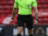 Match referee Stephen Martin during the Sky Bet Championship match between Middlesbrough and Stoke City at the Riverside Stadium in Middlesb...