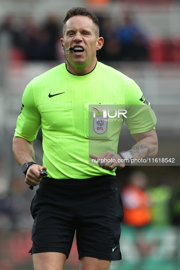 Match referee Stephen Martin during the Sky Bet Championship match between Middlesbrough and Stoke City at the Riverside Stadium in Middlesb...