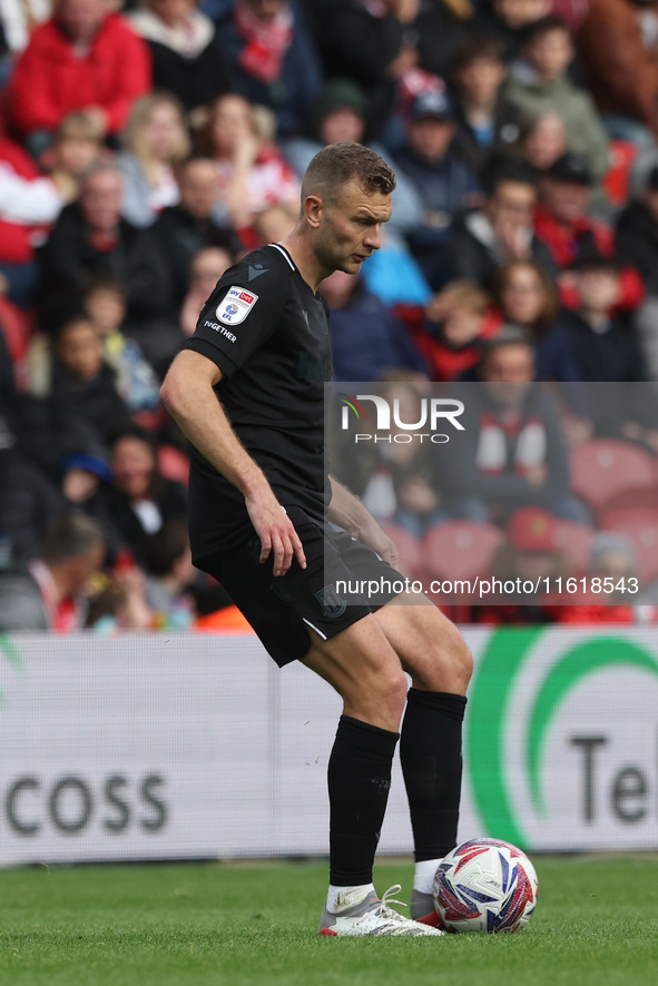 Stoke City's Ben Gibson is in action during the Sky Bet Championship match between Middlesbrough and Stoke City at the Riverside Stadium in...