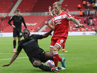 Stoke City's Junior Tchamadeu is in action against Middlesbrough's Riley McGree during the Sky Bet Championship match between Middlesbrough...