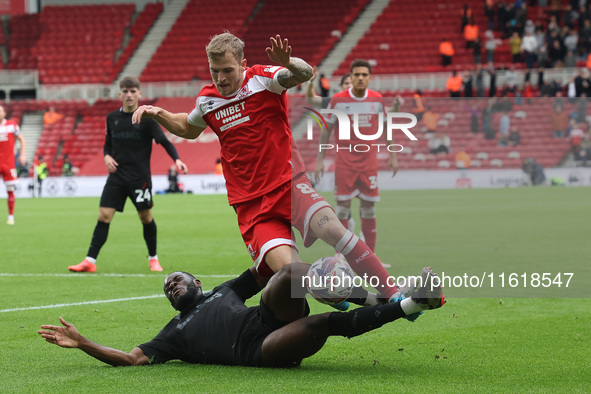 Stoke City's Junior Tchamadeu is in action against Middlesbrough's Riley McGree during the Sky Bet Championship match between Middlesbrough...