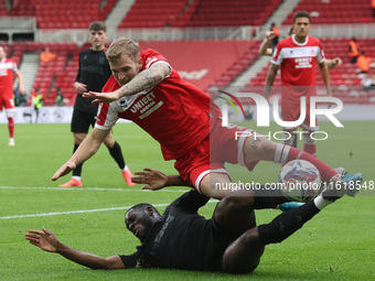 Stoke City's Junior Tchamadeu is in action against Middlesbrough's Riley McGree during the Sky Bet Championship match between Middlesbrough...