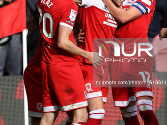 Middlesbrough's Hayden Hackney celebrates with his teammates after scoring the second goal during the Sky Bet Championship match between Mid...