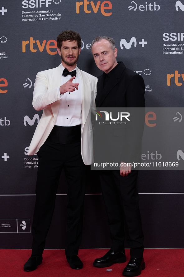 Andrew Garfield and John Crowley attend the closing red carpet during the 72nd edition of the San Sebastian International Film Festival in S...