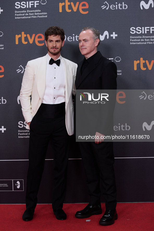 Andrew Garfield and John Crowley attend the closing red carpet during the 72nd edition of the San Sebastian International Film Festival in S...