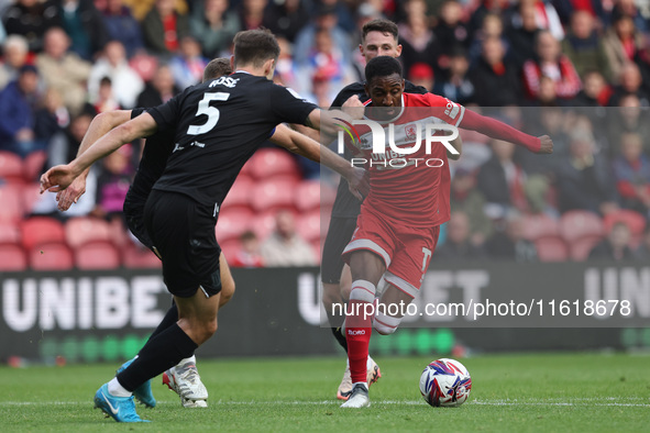 Isaiah Jones of Middlesbrough competes with Michael Rose of Stoke City during the Sky Bet Championship match between Middlesbrough and Stoke...