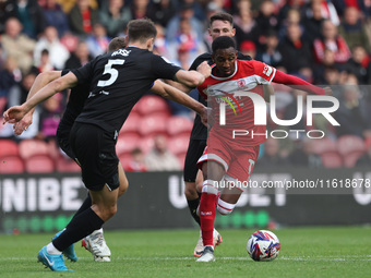 Isaiah Jones of Middlesbrough competes with Michael Rose of Stoke City during the Sky Bet Championship match between Middlesbrough and Stoke...