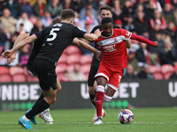 Isaiah Jones of Middlesbrough competes with Michael Rose of Stoke City during the Sky Bet Championship match between Middlesbrough and Stoke...