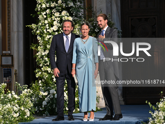 Thomas Flohr, Princess Nina of Greece, and Prince Philippos of Greece arrive at the Metropolitan Cathedral of Athens for the wedding of Prin...