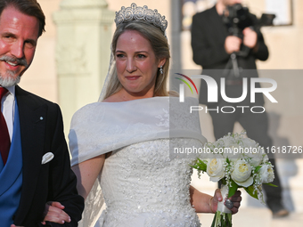 Princess Theodora of Greece arrives at the Metropolitan Cathedral of Athens for her wedding with Matthew Kumar in Athens, Greece, on Septemb...