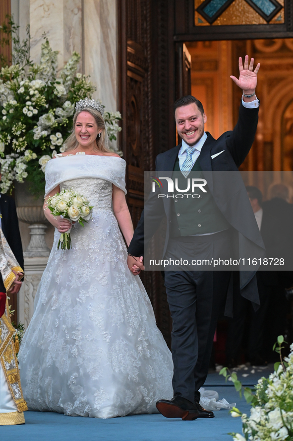 Princess Theodora of Greece and Matthew Kumar exit the Metropolitan Cathedral of Athens after their wedding in Athens, Greece, on September...