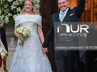 Princess Theodora of Greece and Matthew Kumar exit the Metropolitan Cathedral of Athens after their wedding in Athens, Greece, on September...