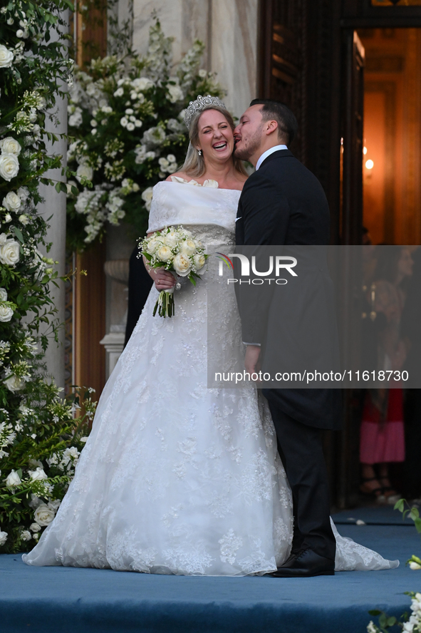 Princess Theodora of Greece and Matthew Kumar kiss as they exit the Metropolitan Cathedral of Athens in Athens, Greece, on September 28, 202...