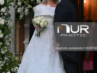 Princess Theodora of Greece and Matthew Kumar kiss as they exit the Metropolitan Cathedral of Athens in Athens, Greece, on September 28, 202...