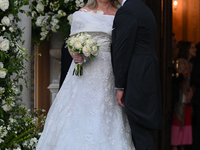 Princess Theodora of Greece and Matthew Kumar kiss as they exit the Metropolitan Cathedral of Athens in Athens, Greece, on September 28, 202...