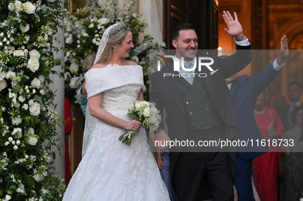 Princess Theodora of Greece and Matthew Kumar exit the Metropolitan Cathedral of Athens after their wedding in Athens, Greece, on September...