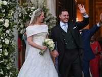 Princess Theodora of Greece and Matthew Kumar exit the Metropolitan Cathedral of Athens after their wedding in Athens, Greece, on September...