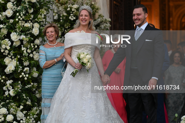 Princess Theodora of Greece and Matthew Kumar exit the Metropolitan Cathedral of Athens after their wedding in Athens, Greece, on September...