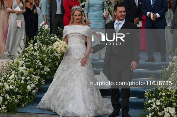 Princess Theodora of Greece and Matthew Kumar exit the Metropolitan Cathedral of Athens after their wedding in Athens, Greece, on September...