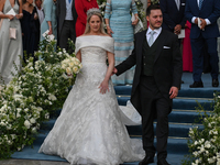 Princess Theodora of Greece and Matthew Kumar exit the Metropolitan Cathedral of Athens after their wedding in Athens, Greece, on September...