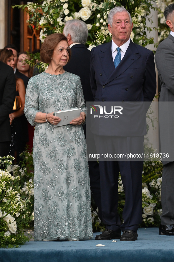 Crown Prince Alexander of Yugoslavia and Crown Princess Katherine of Serbia depart from the Metropolitan Cathedral of Athens after the weddi...